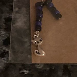 Cat charmed purple and black beaded earrings